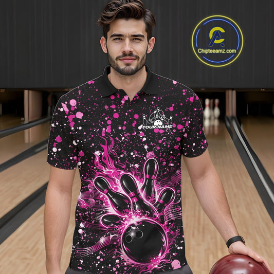 Male model wearing a black bowling polo shirt at the bowling lane with pink music-inspired bowling graphics.