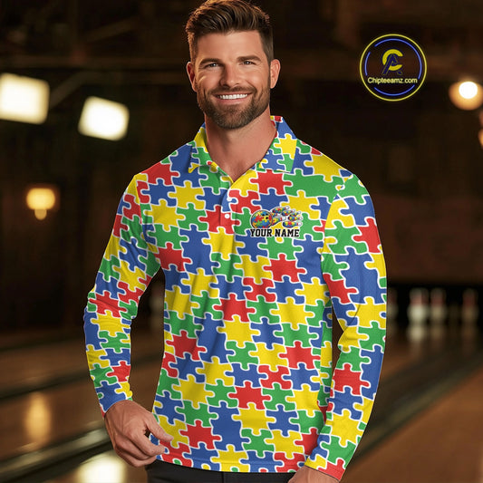 White polo shirt featuring vibrant seamless puzzle pattern in red, blue, green, and yellow arranged in a clean repeating design
