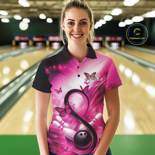 Female model wearing a bowling polo at a bowling center featuring awareness-themed bowling artwork and butterflies.