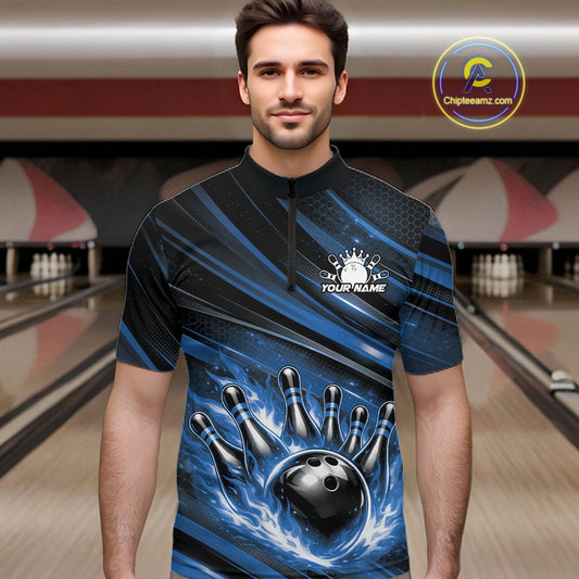 Male model wearing a black and blue bowling quarter-zip shirt at a bowling lane with fiery bowling action artwork and striped accents.