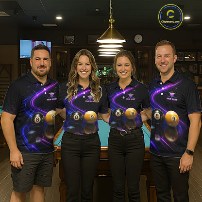 Four people standing together in a dimly lit indoor venue, wearing matching dark navy polo shirts with a purple cosmic billiards graphic featuring 8-ball and 9-ball designs. The background shows a pool table and warm hanging lights.