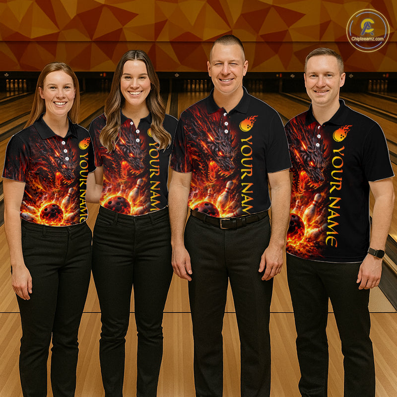 Four people wearing matching bowling shirts with a fiery design on a bowling alley.