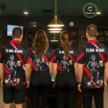 Load image into Gallery viewer, Four people wearing matching bowling shirts with a skeleton design in a bowling alley.
