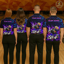 Load image into Gallery viewer, Four people wearing matching bowling team shirts with a colorful design on a bowling alley.