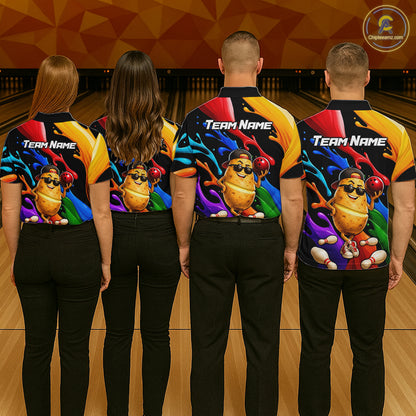 Four people wearing colorful bowling shirts with a cartoon character and 'Team Name' text at a bowling alley.