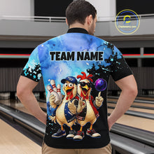 Load image into Gallery viewer, Person wearing a colorful bowling-themed shirt with cartoon chickens on a bowling alley.