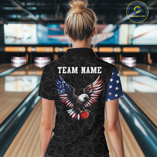 Load image into Gallery viewer, Person wearing a black shirt with an eagle design and 'TEAM NAME' text in a bowling alley.