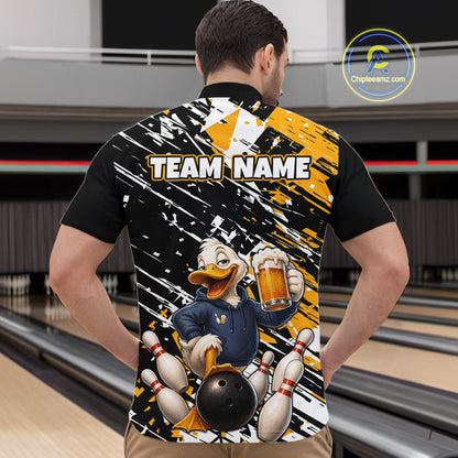 A man viewed from behind wearing a custom bowling-themed short-sleeve shirt with a large graphic of a cartoon duck holding a bowling ball and pins, with 'TEAM NAME' printed across the back. The shirt features a black, white, and yellow paint-splatter design.