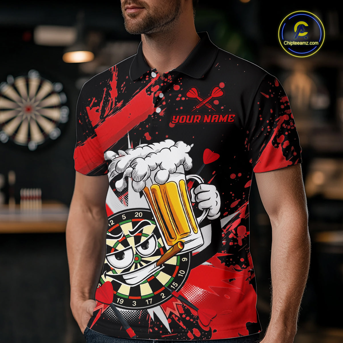 A man wearing a black and red short-sleeve polo shirt with a dartboard cartoon graphic of a mug holding a beer and a dartboard, set in a blurred bar environment. 