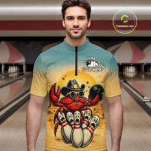 Load image into Gallery viewer, Man wearing a colorful shirt with a cartoon crab design in a bowling alley.