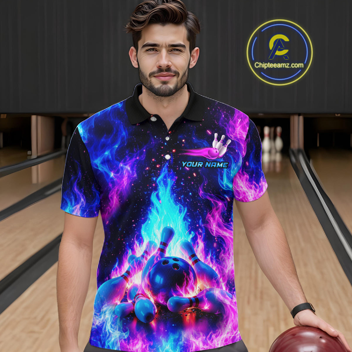 Man wearing a colorful bowling shirt with a bowling ball design in a bowling alley.