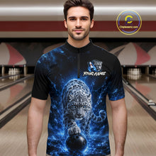 Load image into Gallery viewer, Man wearing a black t-shirt with a blue and ice leopard design in a bowling alley.