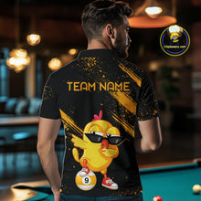 Load image into Gallery viewer, Person wearing a black and yellow shirt with a cartoon chicken design and 'Team Name' text, standing in a bar.