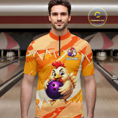 Man wearing a bowling jersey with a cartoon chicken holding a bowling ball design in a bowling alley.