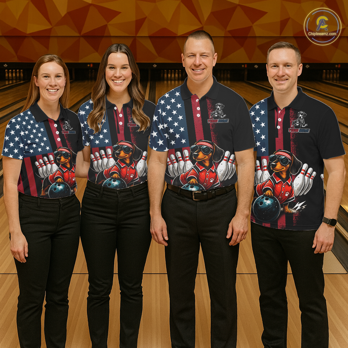 Four people wearing matching bowling shirts in a bowling alley.