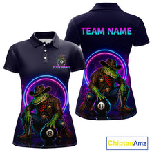 Load image into Gallery viewer, Black polo shirt with a colorful design of a crocodile in a cowboy outfit, holding an 8-ball, on a white background. 'Chiptee Amz' brand visible.
