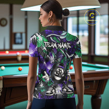 Load image into Gallery viewer, Person wearing a colorful polo shirt with a pool ball design in a billiards room.