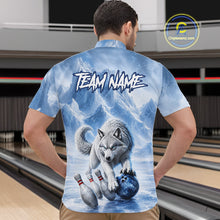 Load image into Gallery viewer, Man wearing a blue shirt with a wolf design and 'TEAM NAME' text in a bowling alley.