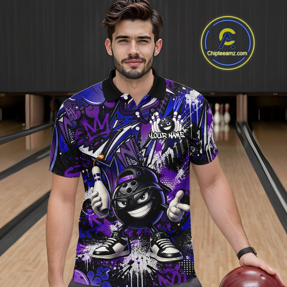 Man wearing a colorful bowling shirt with a cartoon character in a bowling alley.
