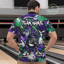 Load image into Gallery viewer, Man wearing a colorful bowling shirt with a cartoon bowling ball design in a bowling alley.