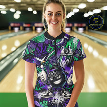 Load image into Gallery viewer, Person wearing a colorful bowling shirt with a graphic design in a bowling alley.