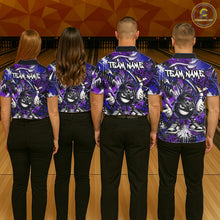 Load image into Gallery viewer, Four people wearing matching purple and black bowling shirts with a team name on a bowling alley.