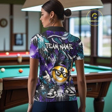 Load image into Gallery viewer, Person wearing a colorful polo shirt with a billiard ball design in a pool hall.