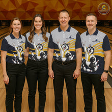 Load image into Gallery viewer, Four people wearing matching bowling shirts with a husky design in a bowling alley.