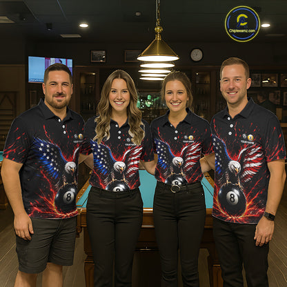 Four people wearing matching biliiard shirts with a design of an eagle, American flag, and 8 ball in a bar setting.
