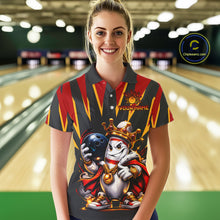 Load image into Gallery viewer, Woman wearing a colorful bowling shirt with a character design in a bowling alley.