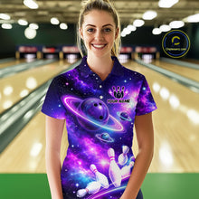 Load image into Gallery viewer, Woman wearing a purple bowling shirt with a galaxy design in a bowling alley.