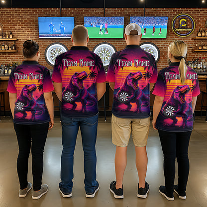 Four people wearing darts polo shirt featuring a dinosaur holding a dartboard with sunset and palm tree artwork on a colorful background