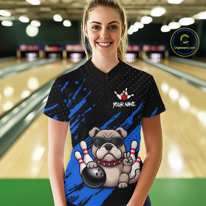 Women’s blue Bulldog bowling quarter zip shirt, front view on female model in bowling lane 