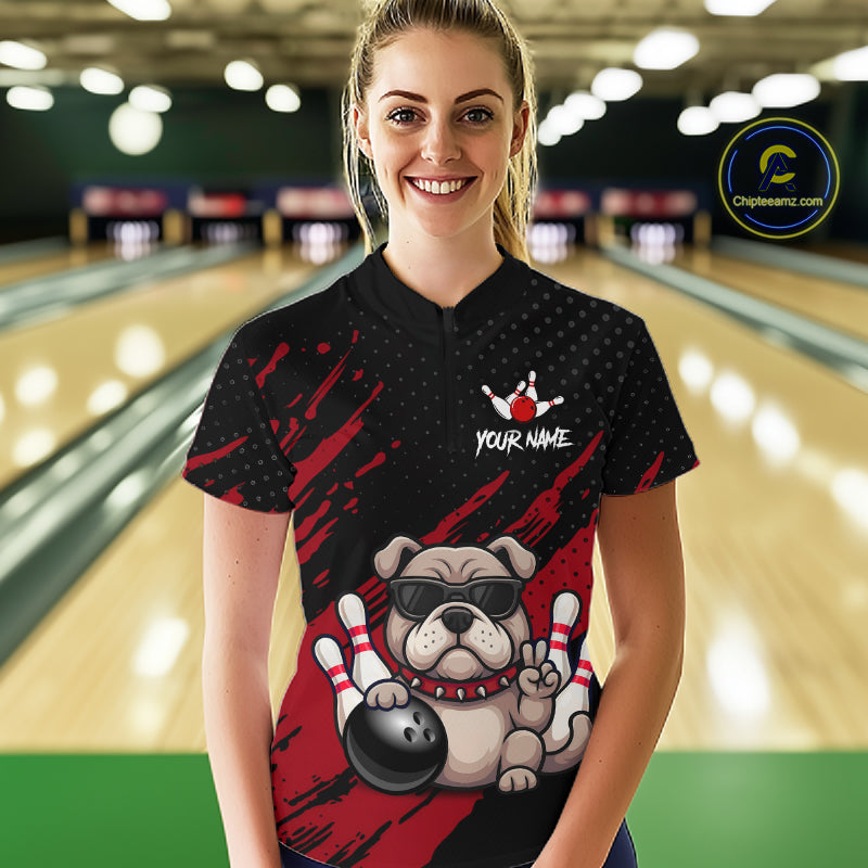 Women’s red Bulldog bowling quarter zip shirt, front view on female model in bowling lane 
