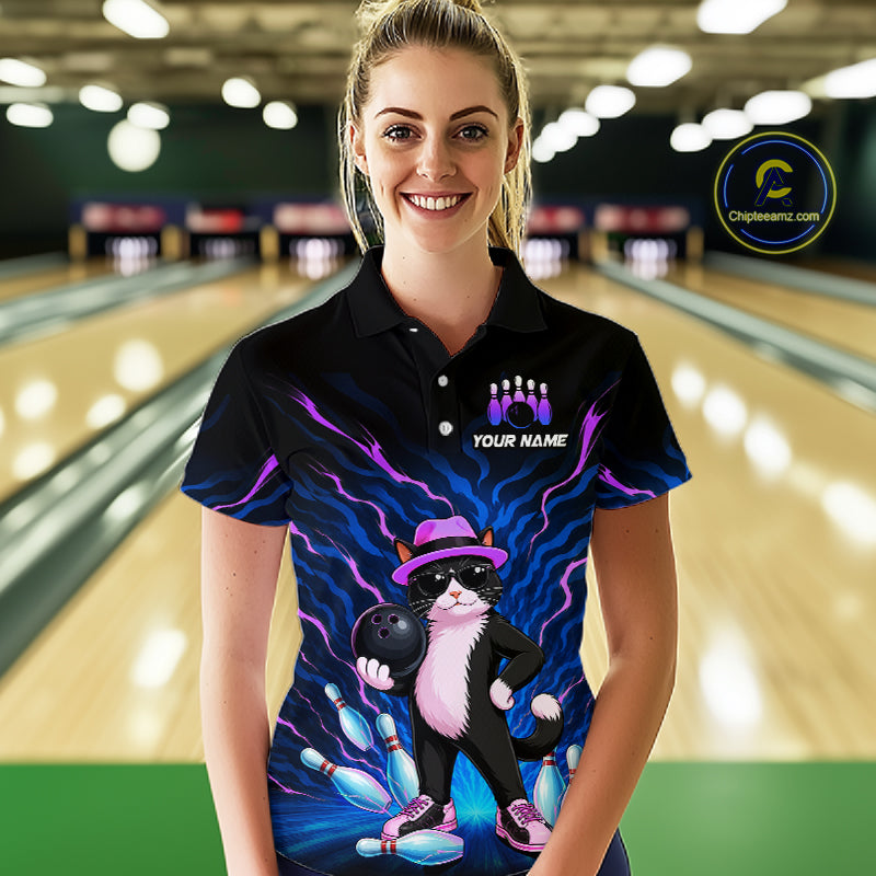 A woman stands in a bowling alley wearing a black short-sleeve polo shirt with a colorful graphic of a cat bowling, purple lightning effects, bowling pins, and the text 'YOUR NAME' on the chest. A circular 'ChileanSeam' watermark is visible in the top right.