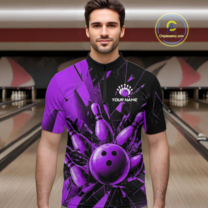 A man wearing a short-sleeve bowling-themed t-shirt with a purple and black bowling pin and ball graphic, standing in a bowling alley. The shirt features a black collar, a purple and black abstract design with bowling pins and a bowling ball, and a white placeholder logo on the left chest that reads 'YOUR NAME' with a bowling pin icon above it.
