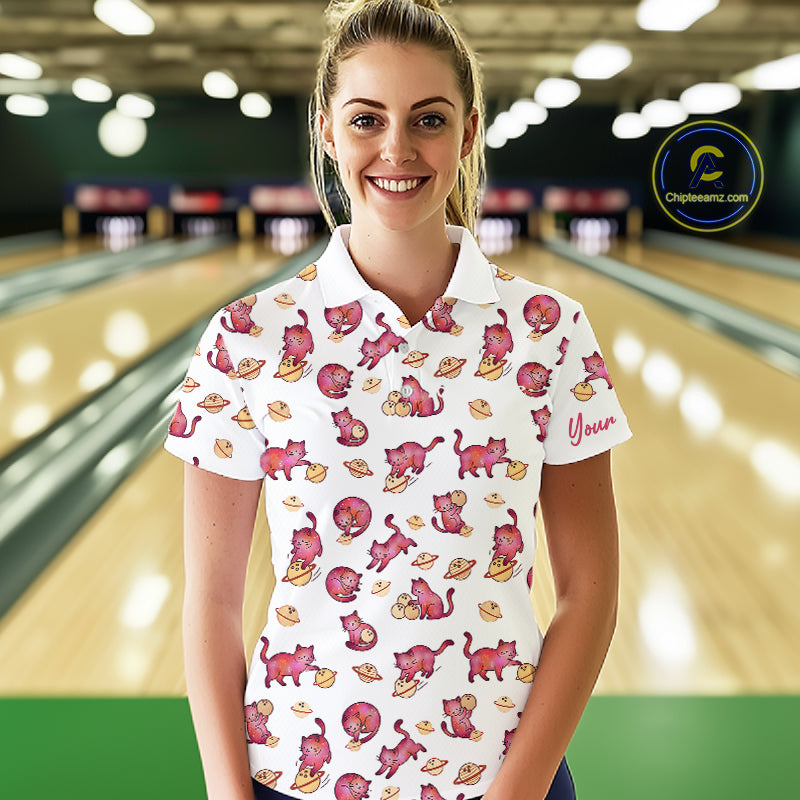 Woman wearing a cat bowling patterned shirt in a bowling alley