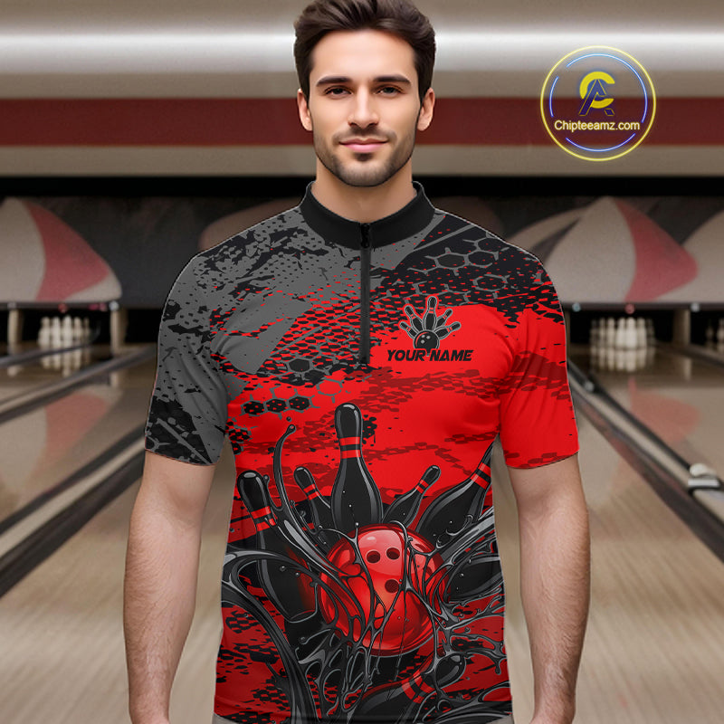 Man wearing a red and black bowling-themed shirt in a bowling alley.