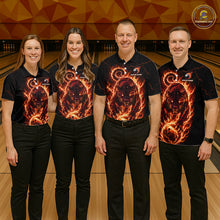 Load image into Gallery viewer, Four people wearing matching shirts with a fiery design on a bowling alley.