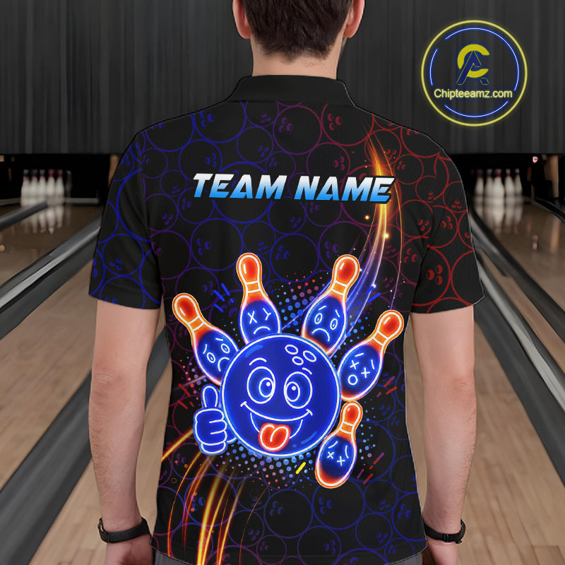 Man standing in a bowling alley wearing a black neon-style bowling polo shirt with a glowing blue cartoon bowling ball mascot, fiery orange pin graphics, and custom name text.