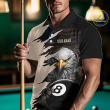 Load image into Gallery viewer, Man wearing a polo shirt with an eagle and pool ball design, holding a pool cue in a billiards setting.