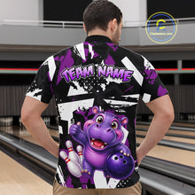 Load image into Gallery viewer, Man wearing a bowling quarter zip shirt featuring a cheerful purple hippo mascot holding a bowling ball, with custom team name text.