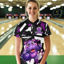 Load image into Gallery viewer, Woman wearing of a black, white, and purple bowling quarter zip shirt featuring a cheerful purple hippo holding a bowling ball, with custom player name text.