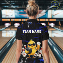Load image into Gallery viewer, Women wearing bowling quarter zip shirt featuring a chick holding a bowling ball surrounded by smiling pins and beer graphics on black yellow background