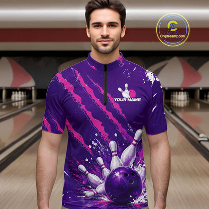 A man wearing a purple and pink bowling-themed short-sleeve mock-neck shirt with bowling pins and balls graphic, standing in a bowling alley. A 'Chiletaniz.