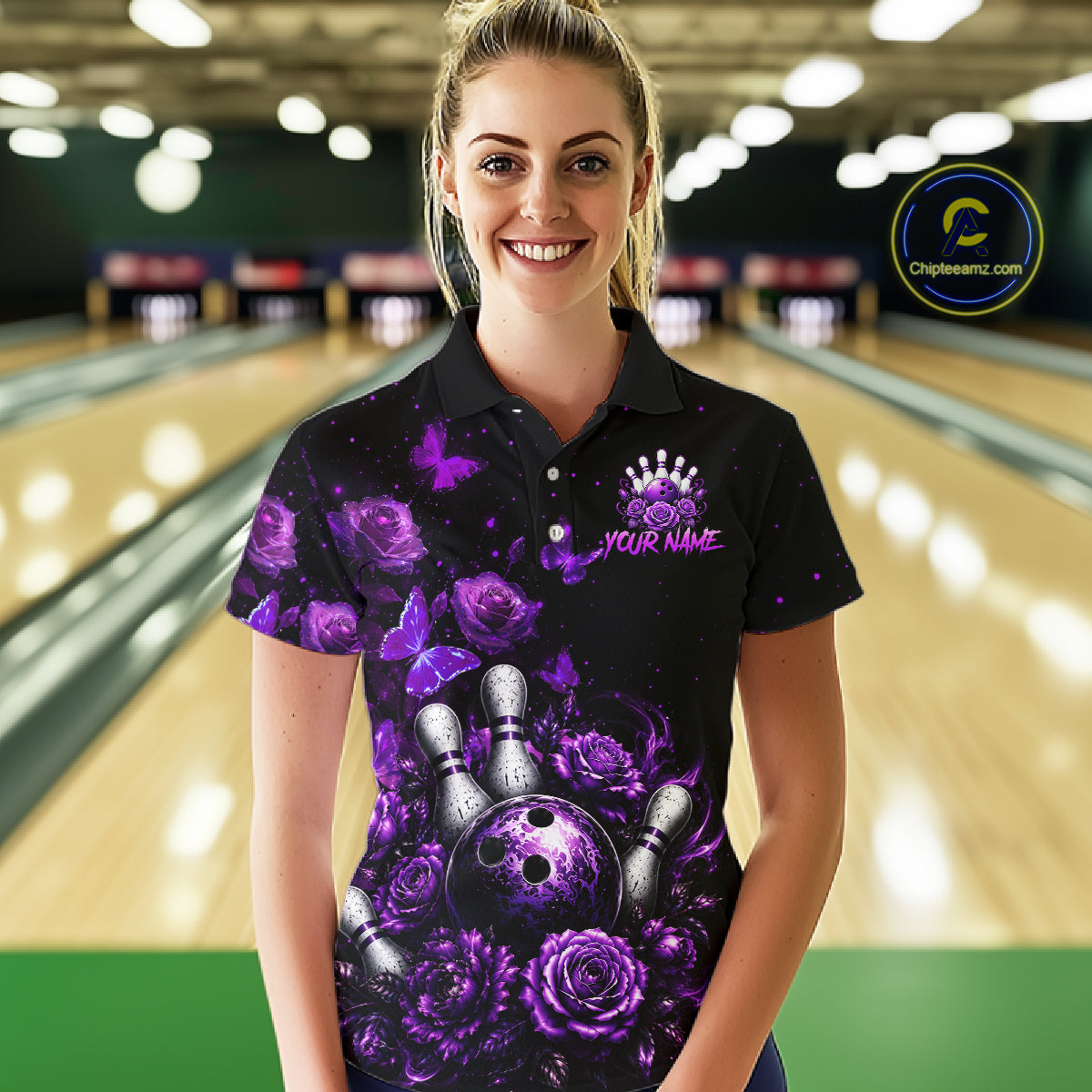 Women’s purple rose butterfly bowling polo shirt, front view on female model in bowling lane 