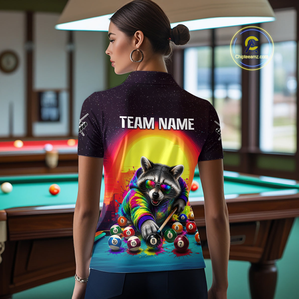 Person wearing a shirt with a raccoon playing pool design in a billiards room.