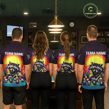 Load image into Gallery viewer, Four people wearing matching shirts with a colorful raccoon design in a pool hall.