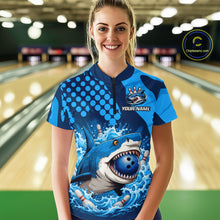 Load image into Gallery viewer, Person wearing a blue bowling shirt with a shark design in a bowling alley.