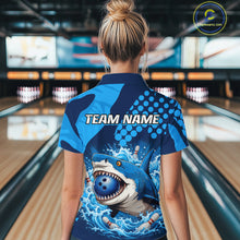 Load image into Gallery viewer, Person wearing a blue and black bowling shirt with a shark design in a bowling alley.